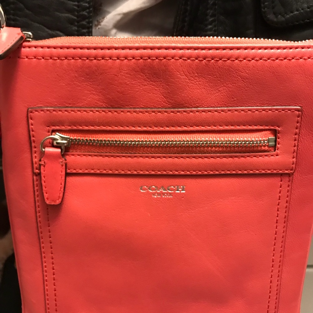 Coach leather coral colored cross body purse 2010